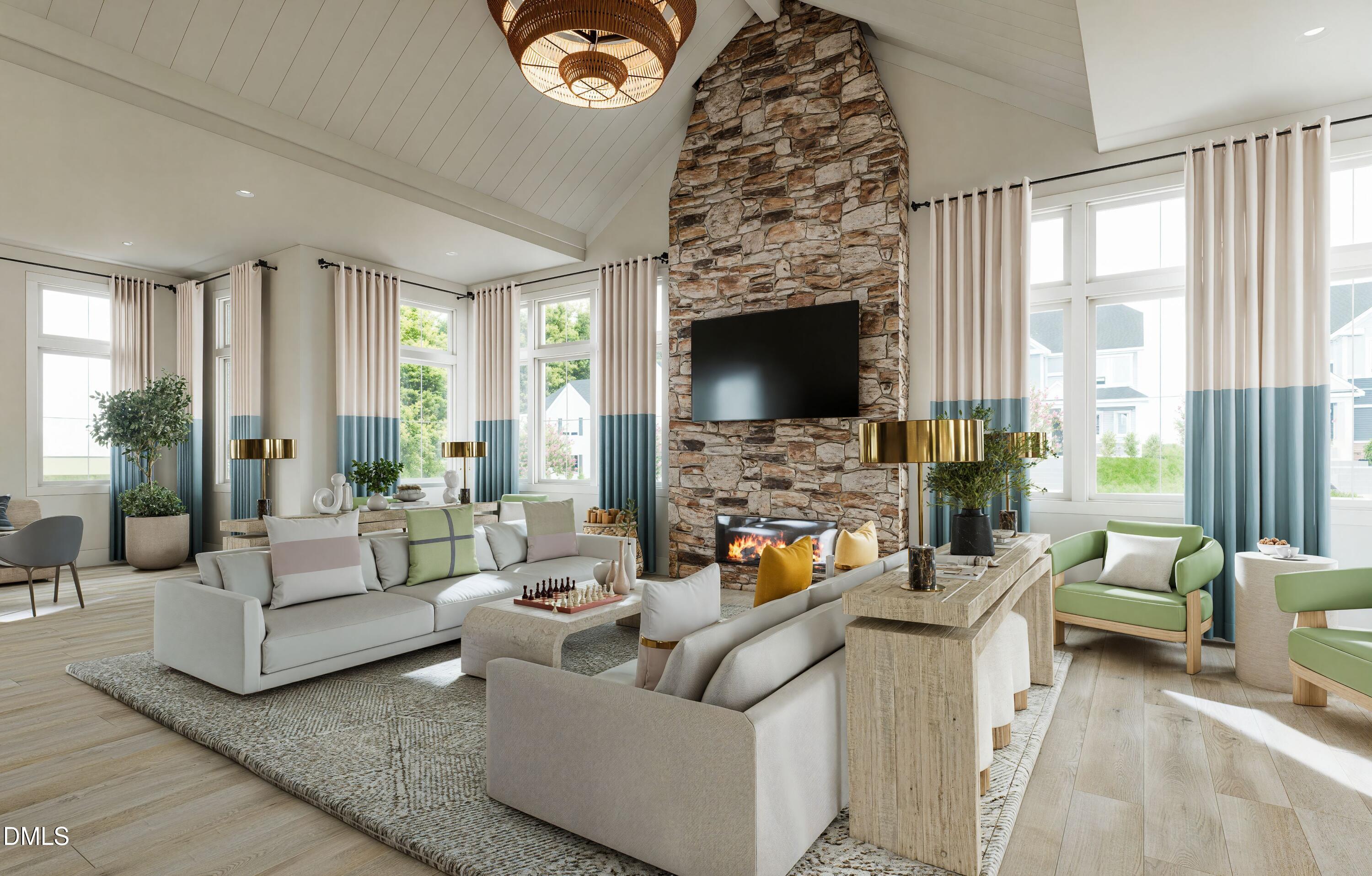 740 Bolera Road Knightdale, NC 27545 - Photo 24 of 32 a living room with furniture and a fireplace