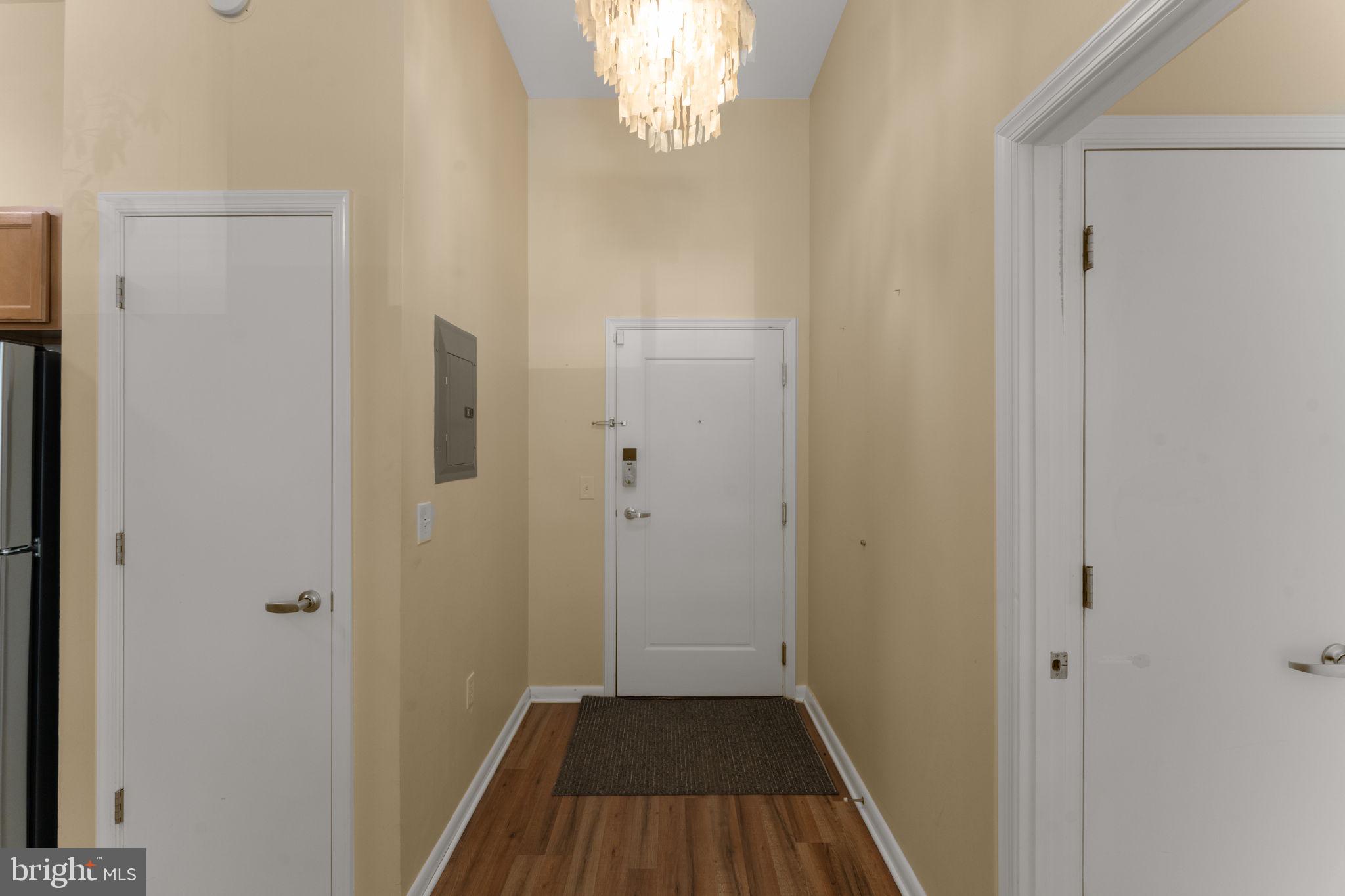355 I Street Southwest, Unit S104 Washington, DC 20024 - Photo 21 of 64 a view of a livingroom from a hallway
