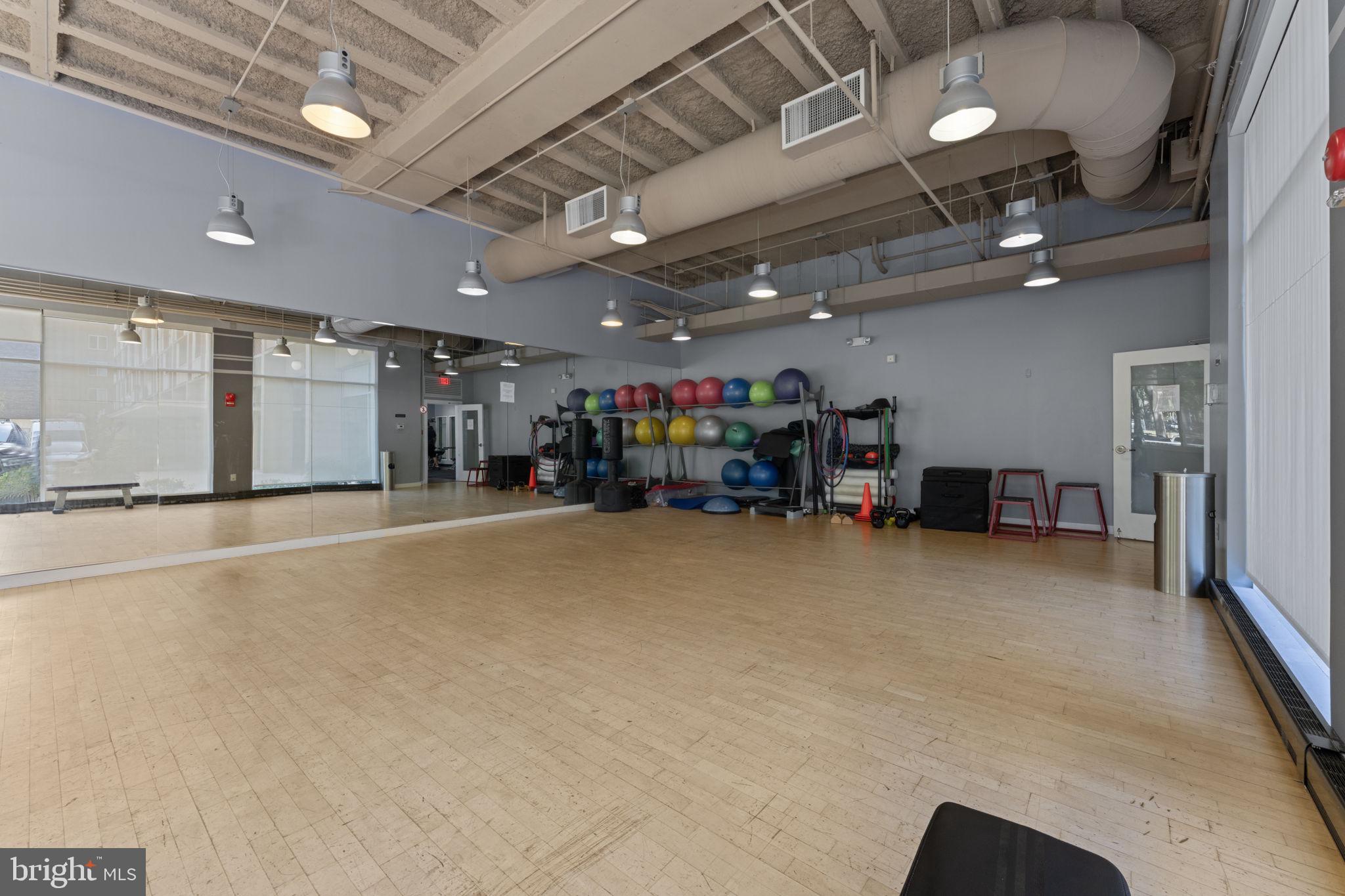 355 I Street Southwest, Unit S104 Washington, DC 20024 - Photo 30 of 64 a big room with furniture
