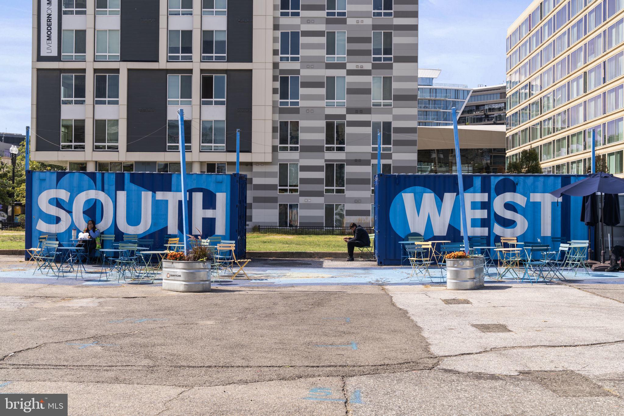 355 I Street Southwest, Unit S104 Washington, DC 20024 - Photo 37 of 64 a view of building with sitting area