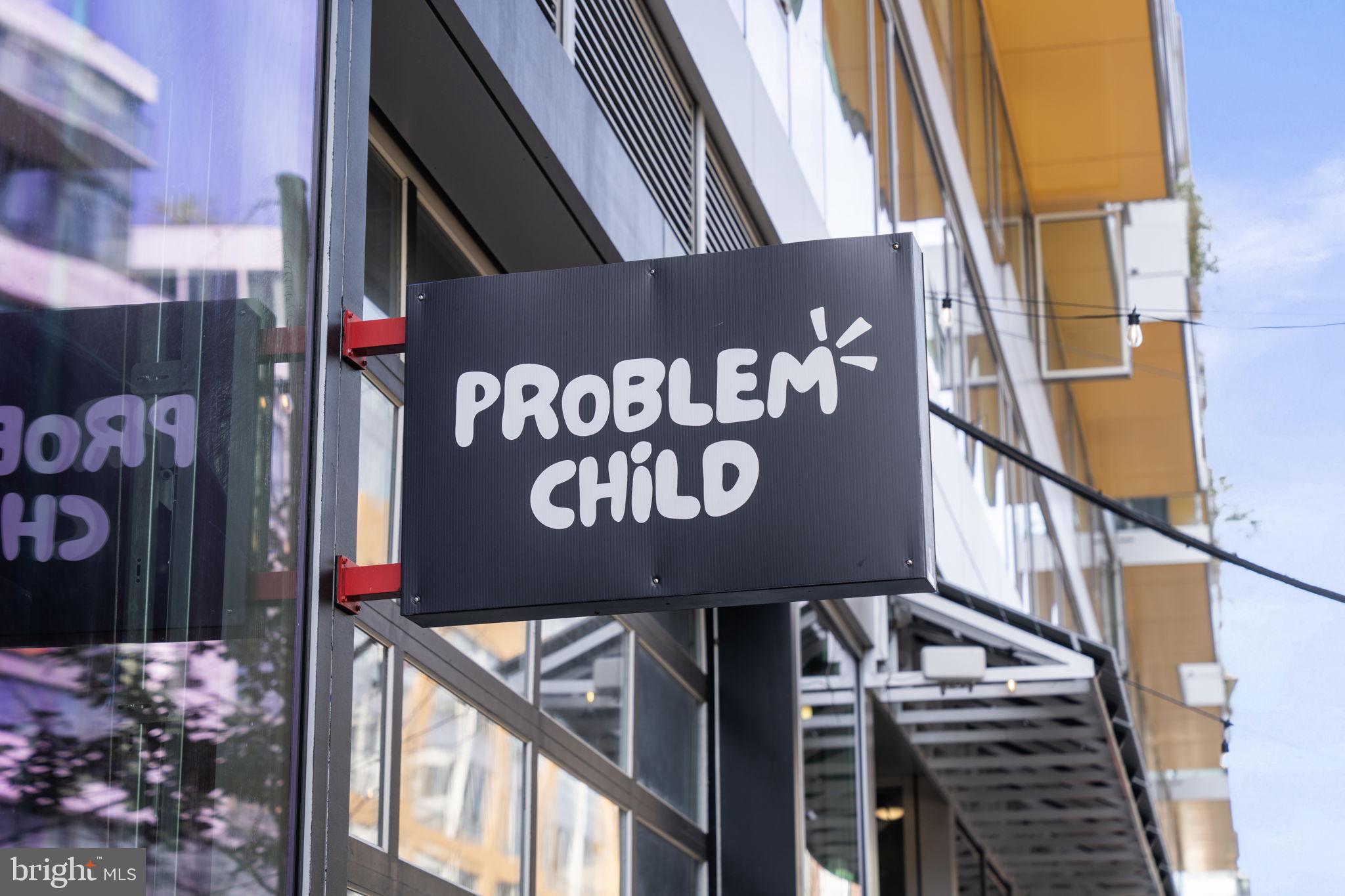 355 I Street Southwest, Unit S104 Washington, DC 20024 - Photo 47 of 64 a sign broad on a brick wall