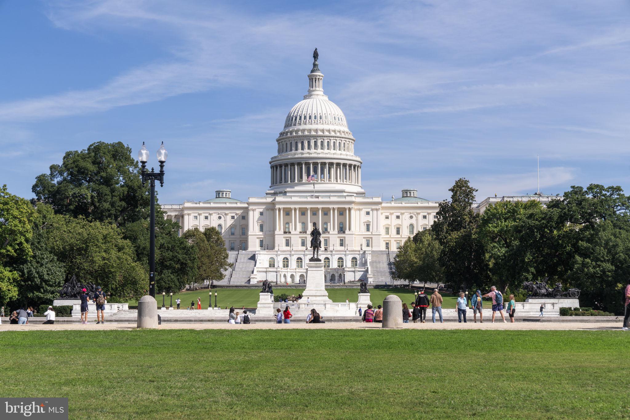 355 I Street Southwest, Unit S104 Washington, DC 20024 - Photo 54 of 64 a front view of a building with trees in the background