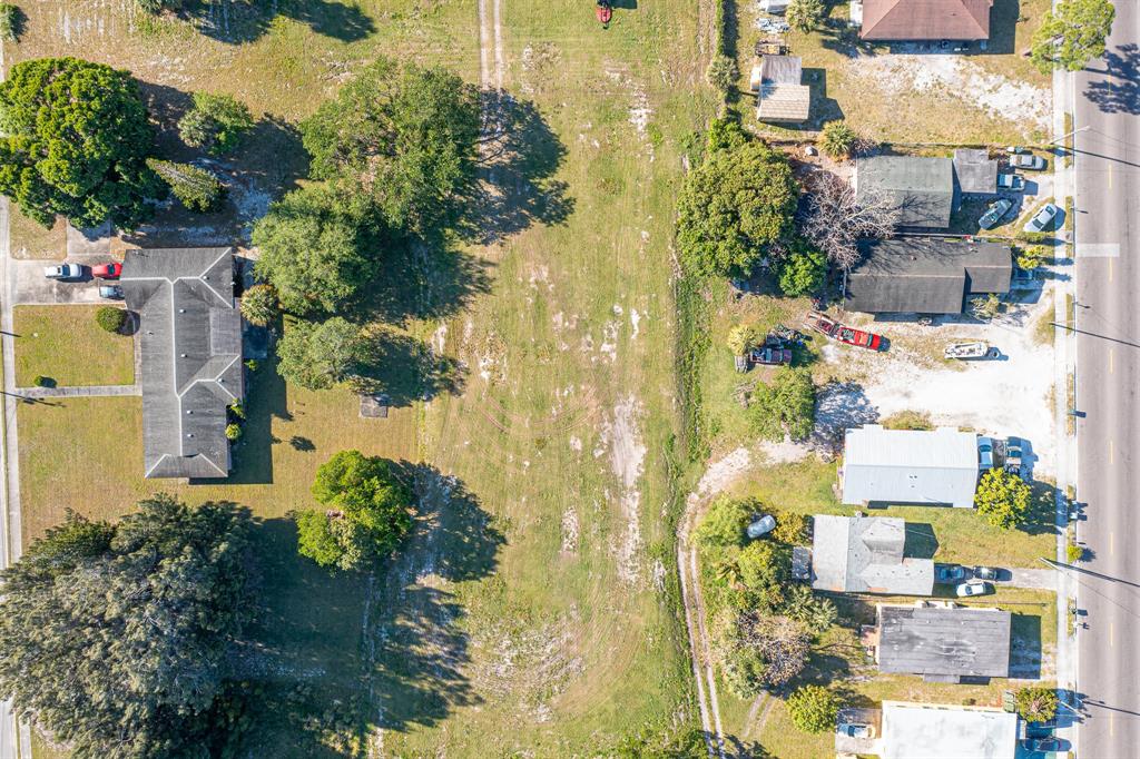 0 North 16th Street Fort Pierce, FL 34950 - Photo 17 of 21 an aerial view of residential houses with outdoor space