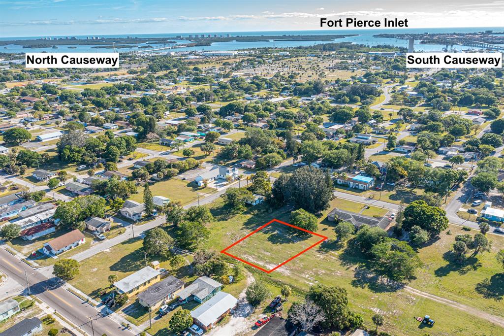 0 North 16th Street Fort Pierce, FL 34950 - Photo 3 of 21 an aerial view of residential houses with outdoor space
