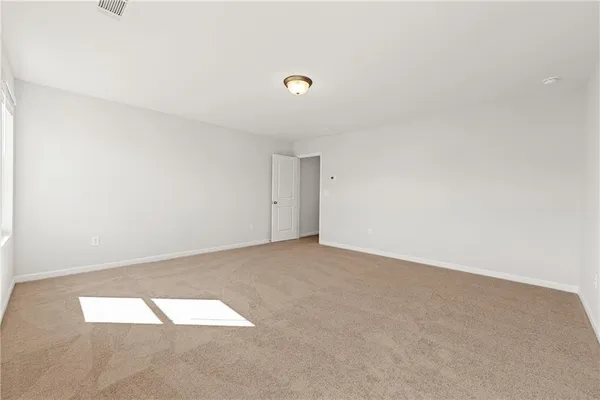 a bathroom with double sink and a mirror