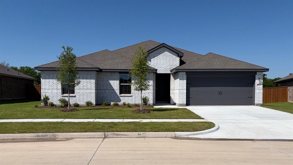 1913 Reveille Way Terrell, TX 75160 - Photo 29 of 35 Contemporary single-story residence featuring light-colored brick facade