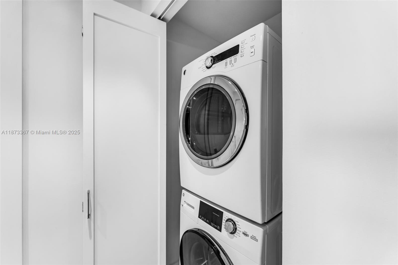 10 Venetian Way, Unit 1903 Miami Beach, FL 33139 - Photo 25 of 49 a utility room with dryer and washer