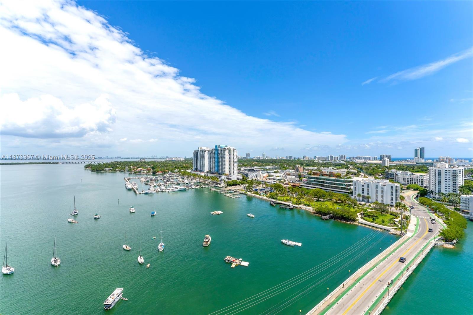 10 Venetian Way, Unit 1903 Miami Beach, FL 33139 - Photo 30 of 49 a view of a lake with a city