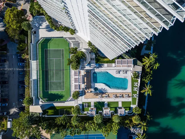 a view of a swimming pool with a lounge chairs