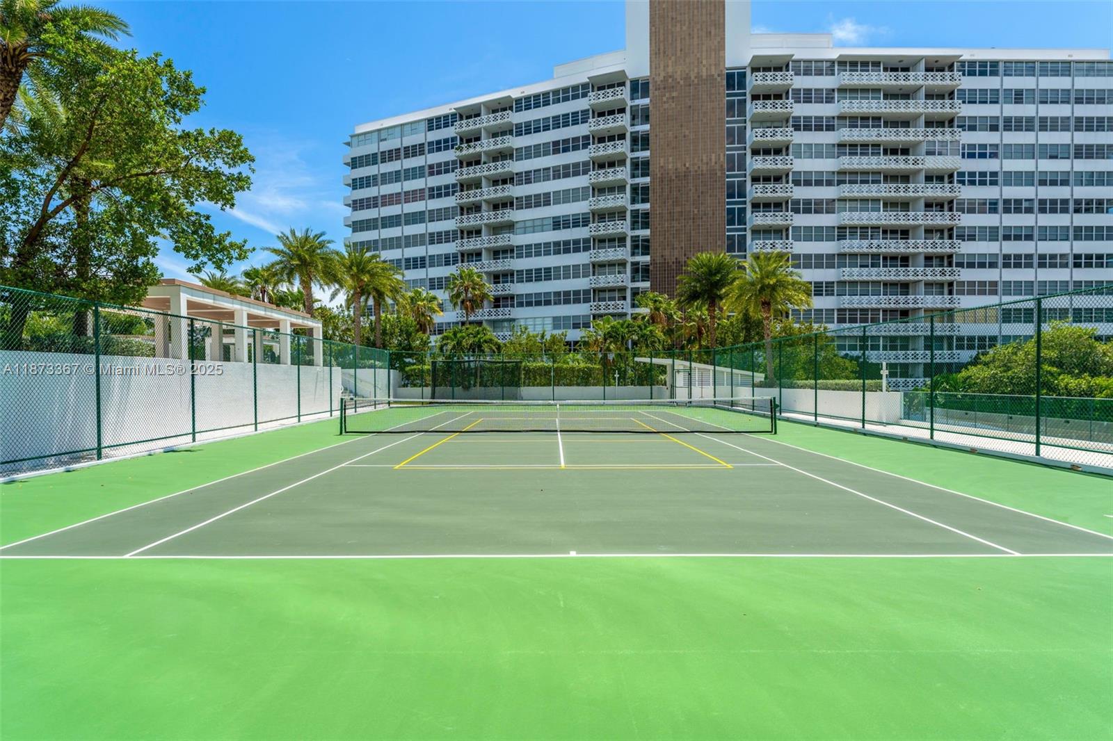 10 Venetian Way, Unit 1903 Miami Beach, FL 33139 - Photo 36 of 49 a view of a tennis court with a building