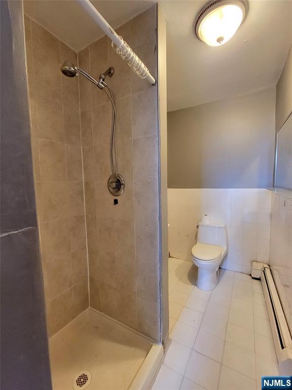 6 6th Street Harrison, NJ 07029 - Photo 11 of 12 a bathroom with a toilet and a shower