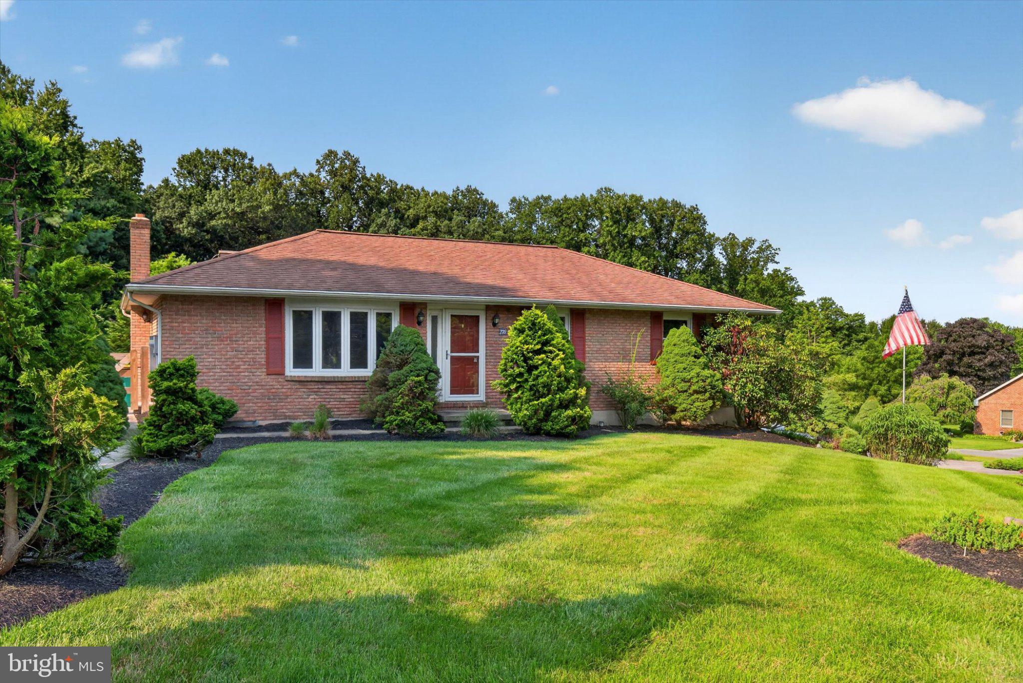 239 Lawn Road Palmyra, PA 17078 - Photo 2 of 64 Charming brick home with lush landscaping.