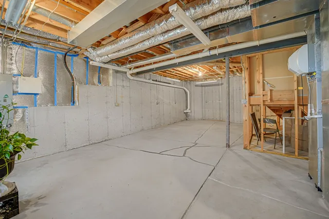 a view of a room with wooden walls