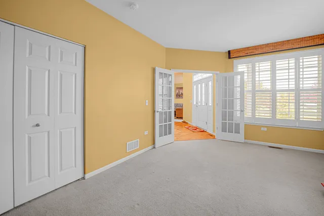 a view of an empty room with window