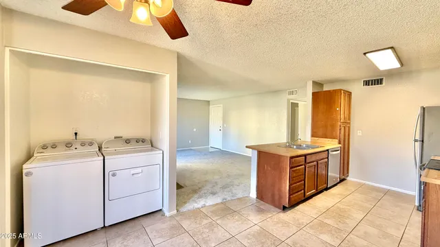 a kitchen with a stove and a sink