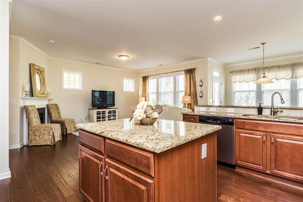 1413 Van Page Boulevard Raleigh, NC 27607 - Photo 8 of 25 OPEN KITCHEN INCLUDING GRANITE COUNTER TOPS AND ___ CABINETS. KITCHEN