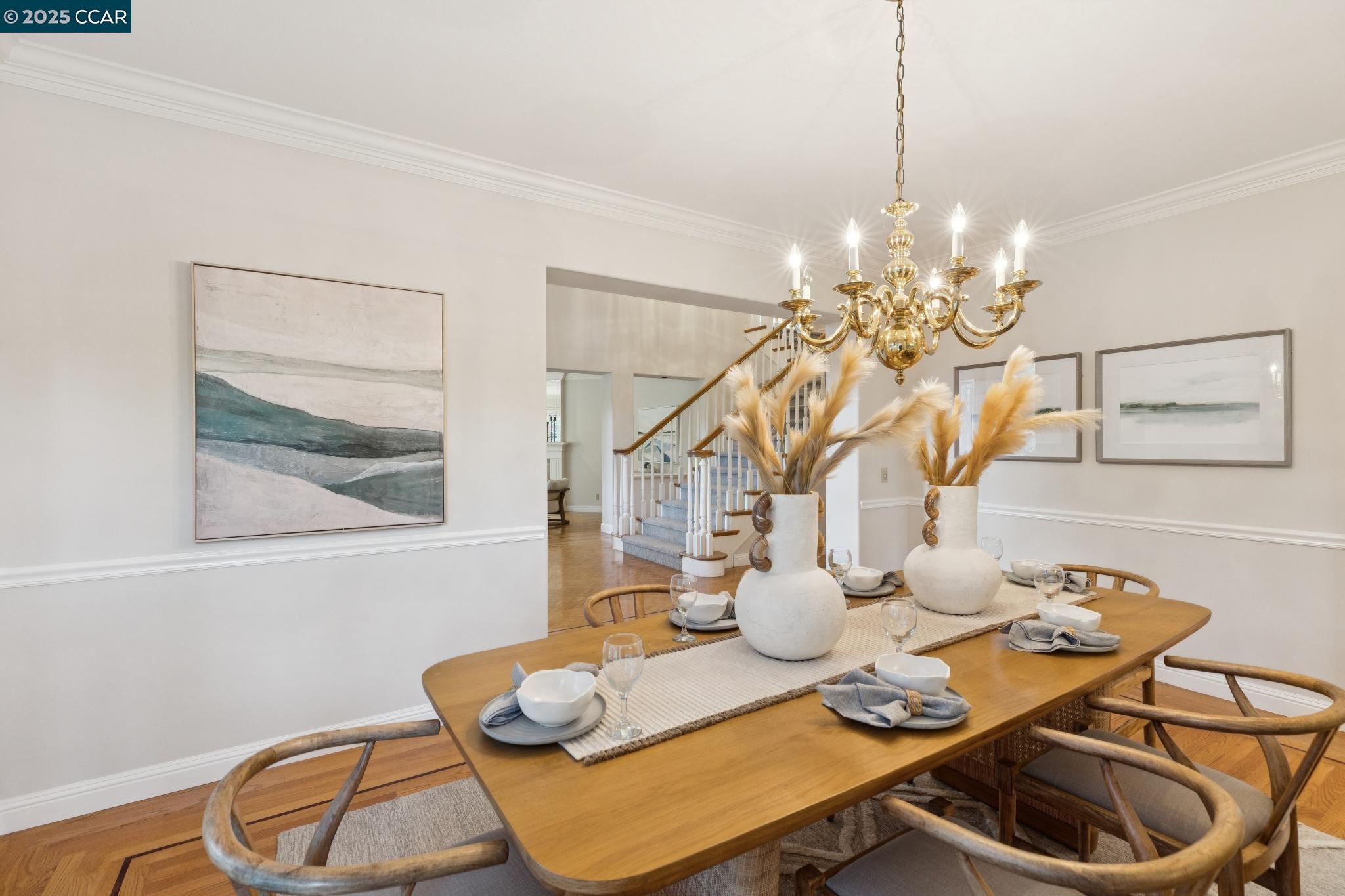 788 Woodwind Place Walnut Creek, CA 94598 - Photo 11 of 48 a view of a dining room with furniture a chandelier and wooden floor