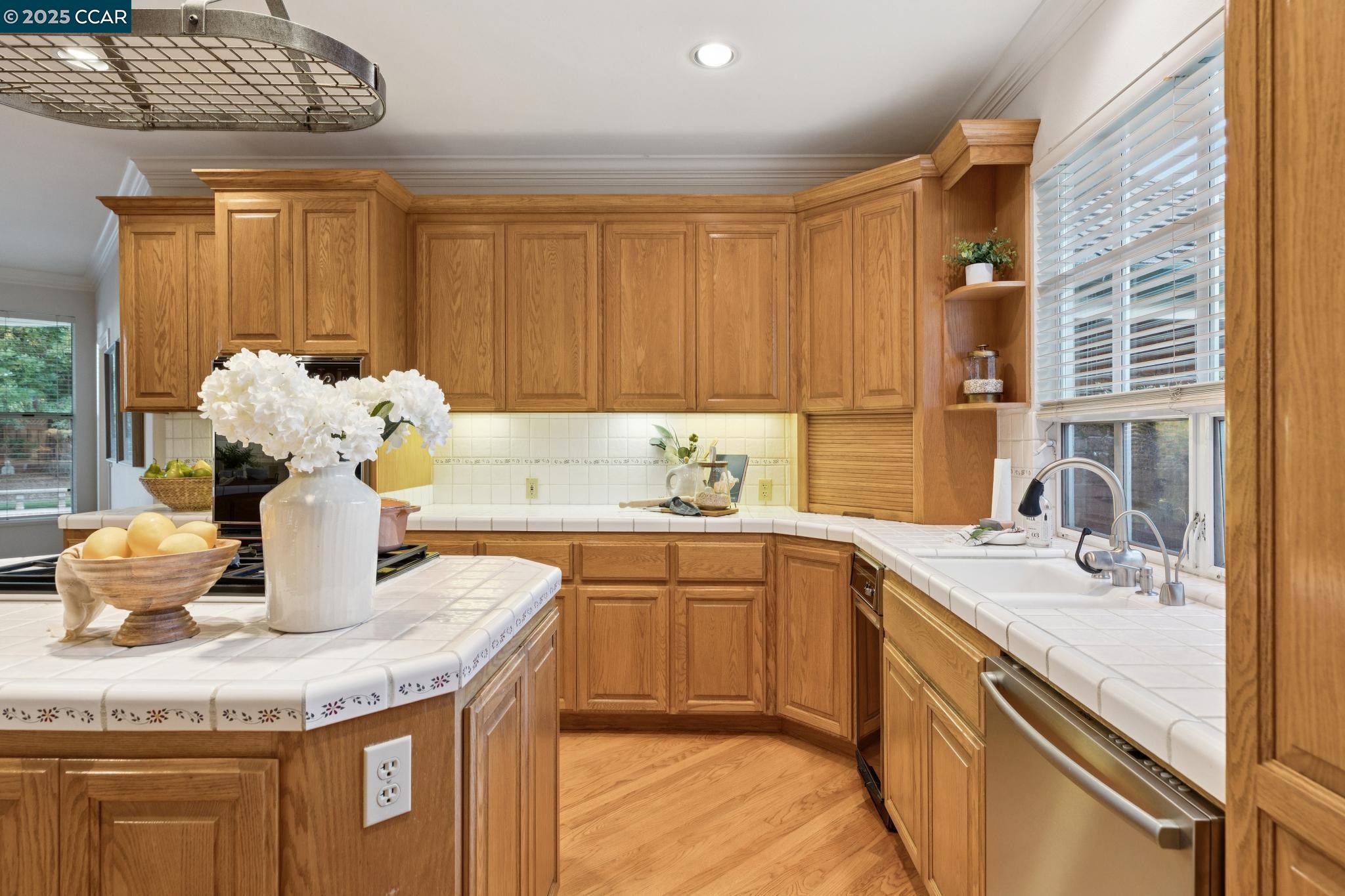 788 Woodwind Place Walnut Creek, CA 94598 - Photo 14 of 48 a kitchen with a sink and cabinets