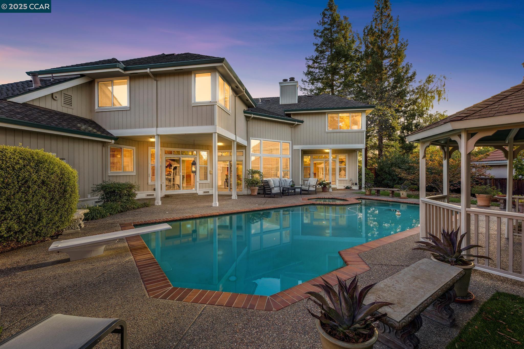 788 Woodwind Place Walnut Creek, CA 94598 - Photo 2 of 48 a view of a house with a swimming pool