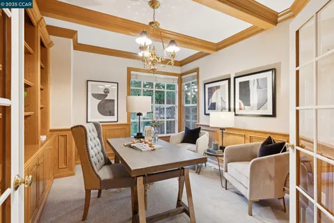 a view of a workspace with furniture