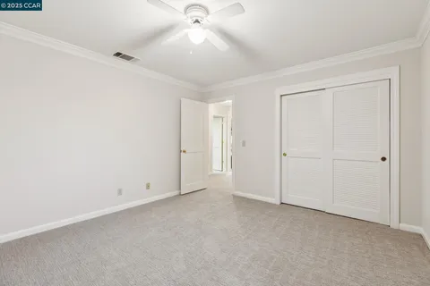 a kitchen with stainless steel appliances granite countertop a sink a stove and cabinets