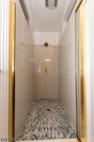 636 Valley Road Watchung, NJ 07069 - Photo 22 of 43 a bathroom with a sink and a shower