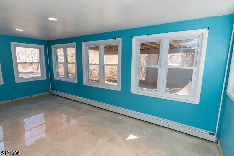 636 Valley Road Watchung, NJ 07069 - Photo 31 of 43 a view of an empty room with a window