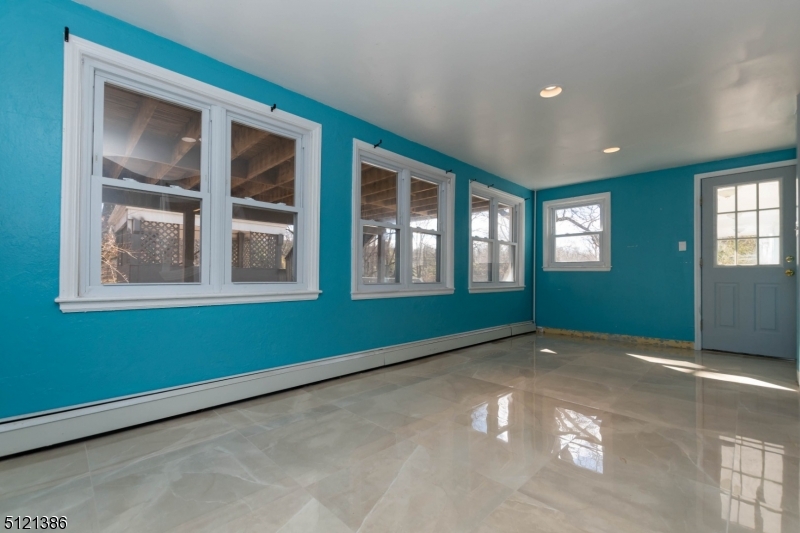 636 Valley Road Watchung, NJ 07069 - Photo 32 of 43 a view of an empty room with a window