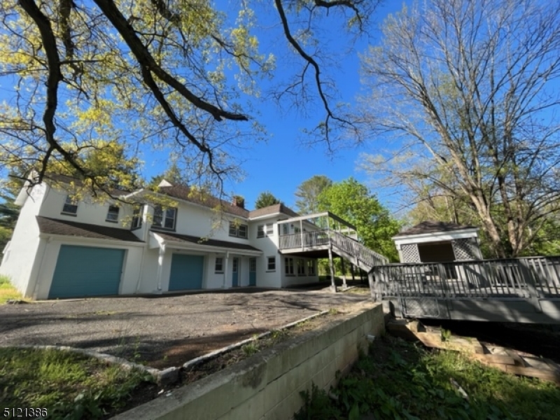 636 Valley Road Watchung, NJ 07069 - Photo 39 of 43 a front view of a house with a yard