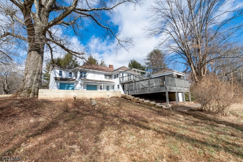 636 Valley Road Watchung, NJ 07069 - Photo 40 of 43 a view of a house with a yard