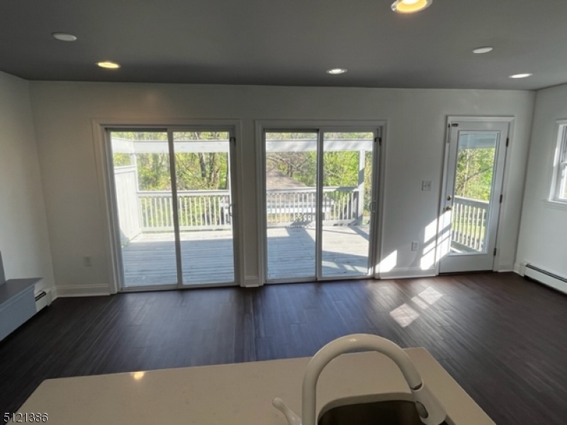 636 Valley Road Watchung, NJ 07069 - Photo 43 of 43 a view of room with window and wooden floor