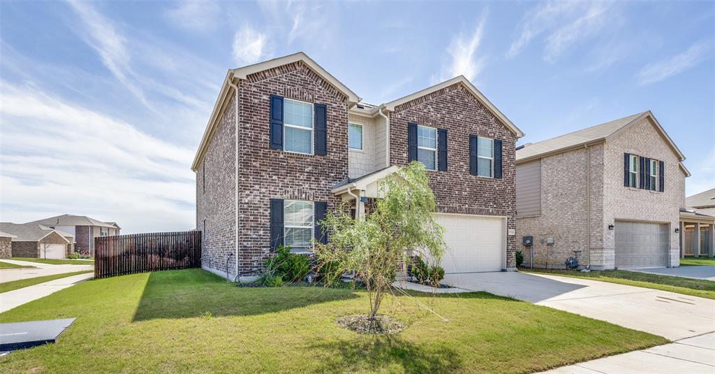 16024 Pemberly Lane Haslet, TX 76052 - Photo 2 of 23 a front view of a house with a yard and garage