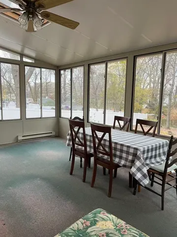 a view of an empty room with a balcony