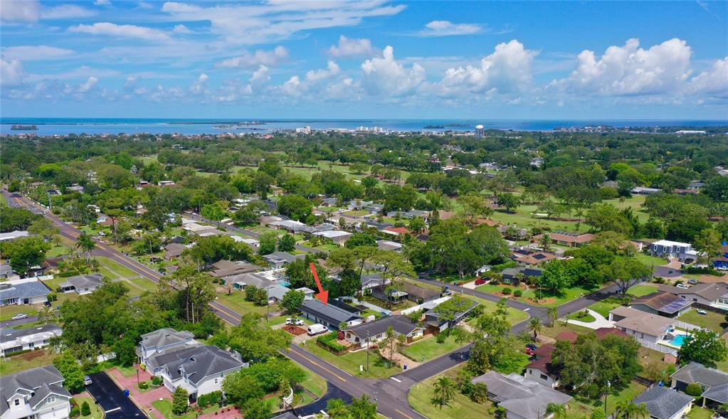 1290 Michigan Boulevard Dunedin, FL 34698 - Photo 39 of 45 an aerial view of multiple house