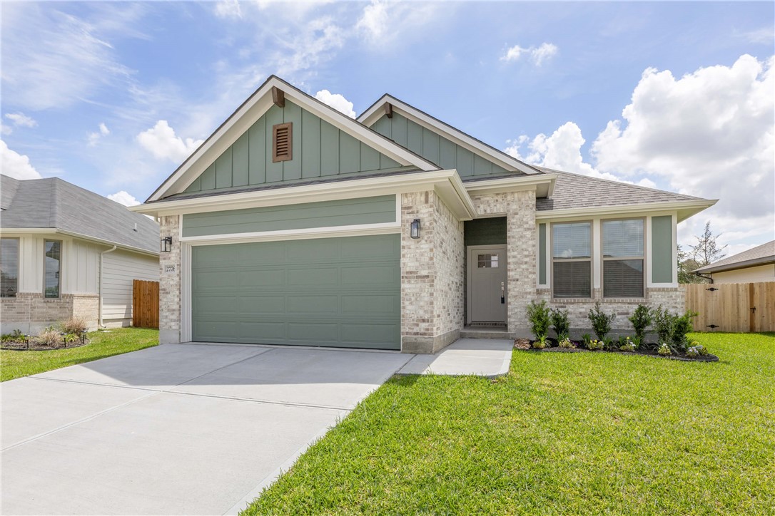 2776 Messenger Way Bryan, TX 77803 - Photo 2 of 16 a front view of a house with garden
