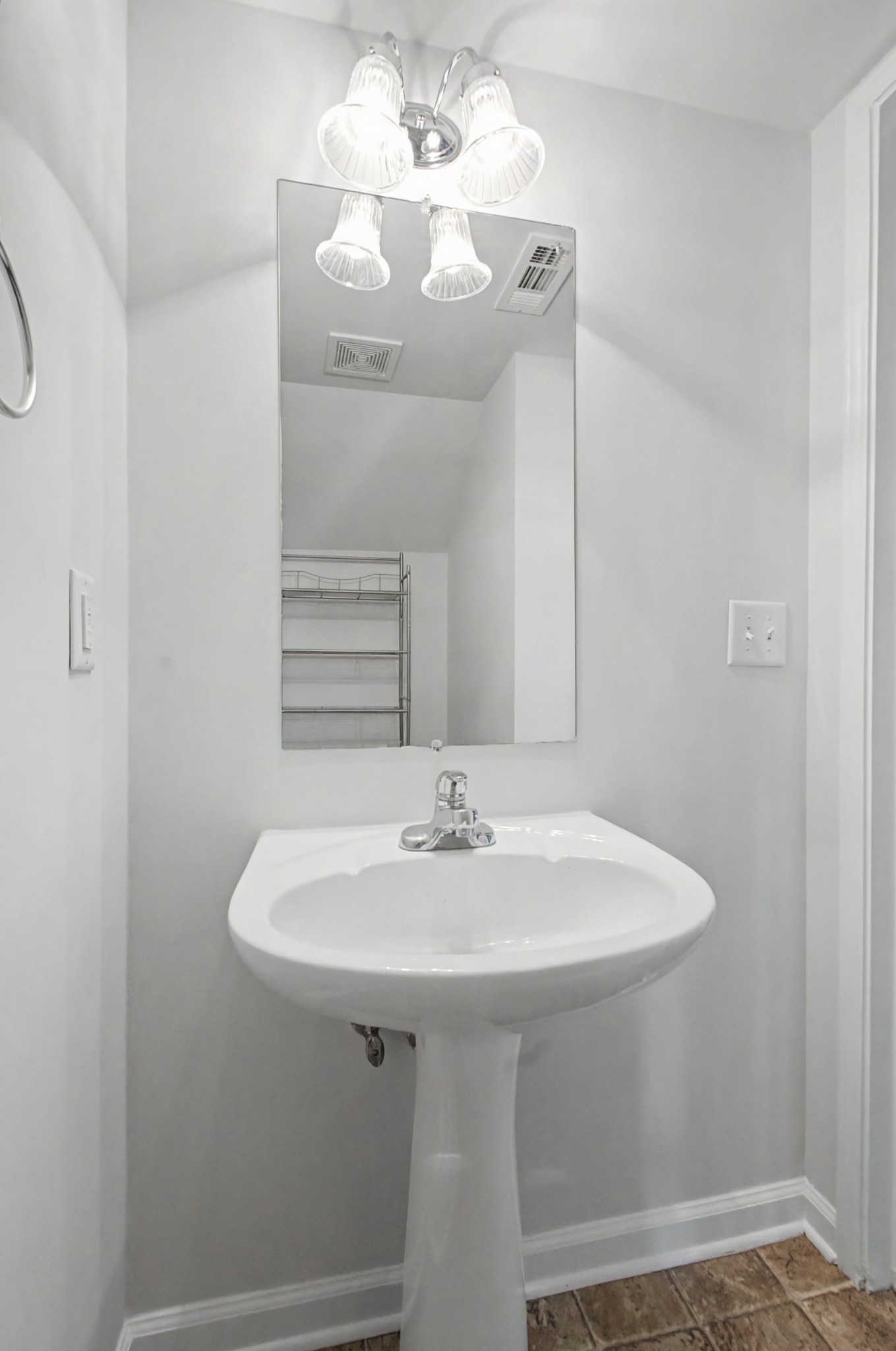 7405 Rice Court Fairview, TN 37062 - Photo 19 of 33 a bathroom with a sink a mirror and a vanity