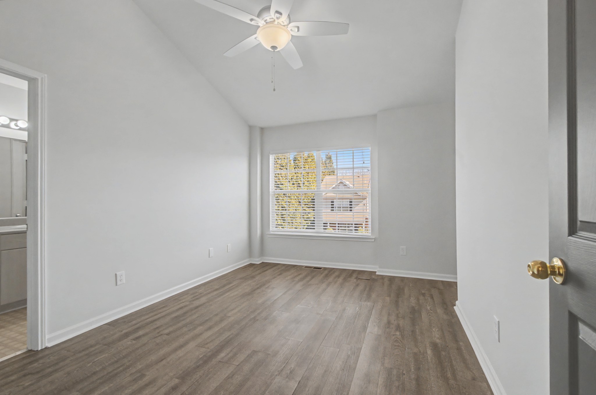 7405 Rice Court Fairview, TN 37062 - Photo 22 of 33 wooden floor in an empty room with a window