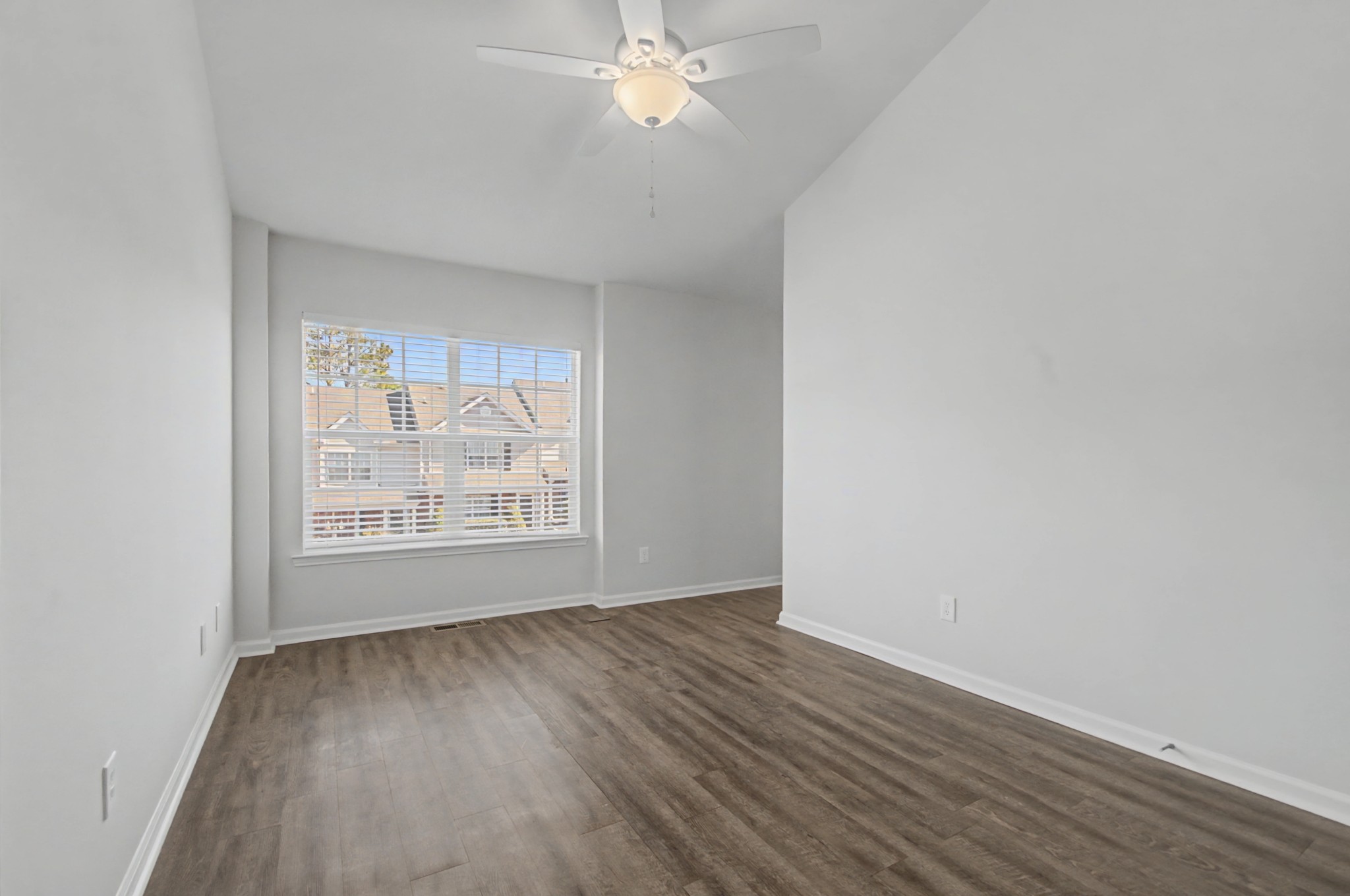 7405 Rice Court Fairview, TN 37062 - Photo 23 of 33 a view of wooden floor and windows in a room