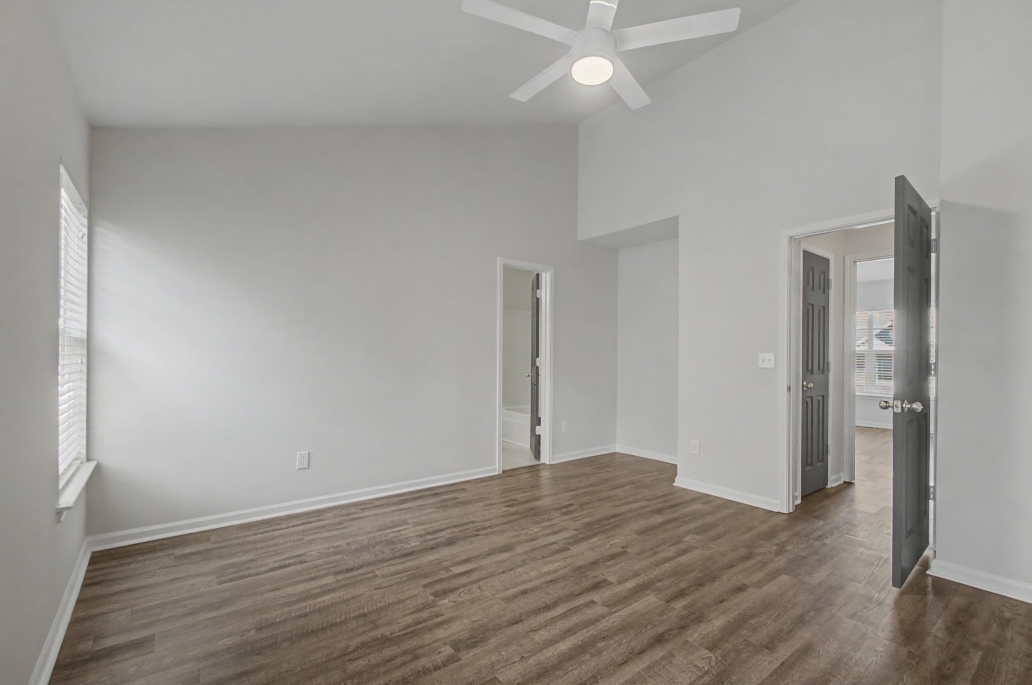 7405 Rice Court Fairview, TN 37062 - Photo 28 of 33 an empty room with wooden floor and windows