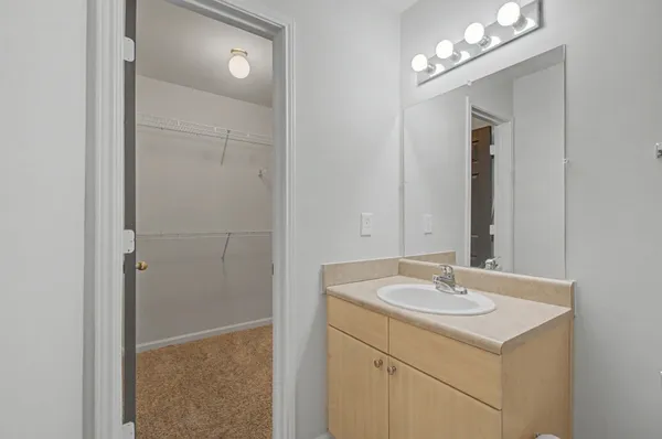 a bathroom with a sink toilet tub and shower