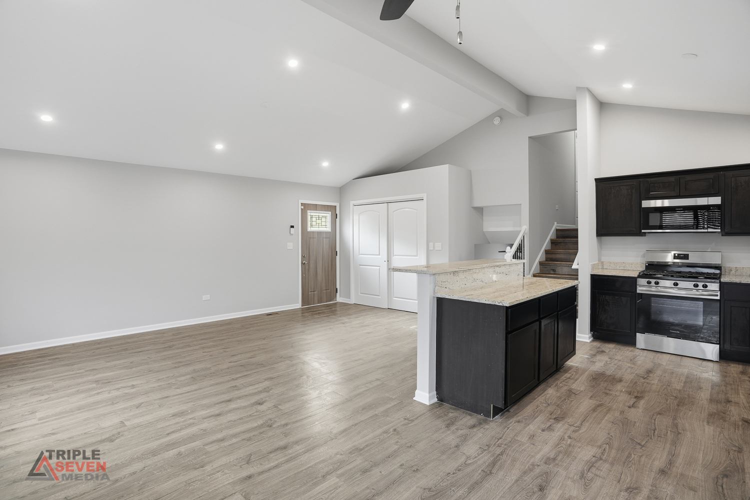 14528 Kolin Avenue Midlothian, IL 60445 - Photo 3 of 29 a kitchen with stainless steel appliances kitchen island granite countertop a refrigerator and a stove top oven