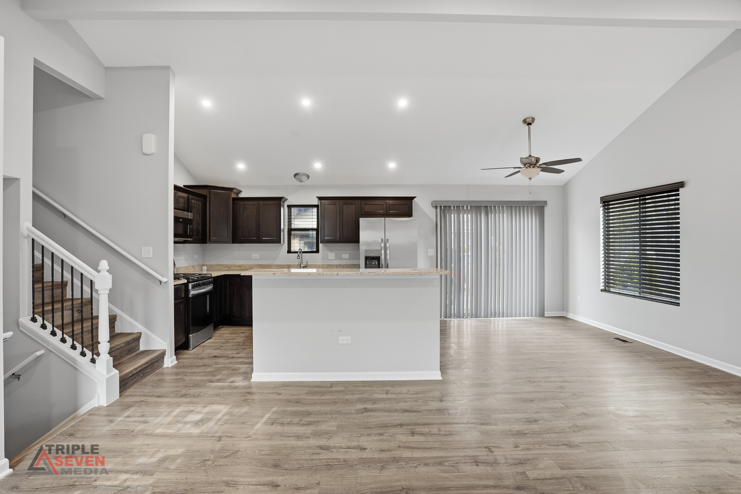 14528 Kolin Avenue Midlothian, IL 60445 - Photo 6 of 29 a view of kitchen with kitchen island microwave oven stove and oven