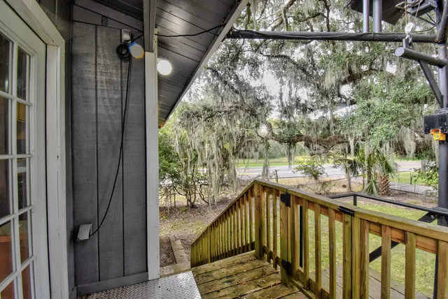 a kitchen with a stove a sink and a refrigerator