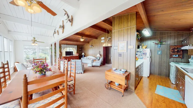 a kitchen with lots of counter top space and stainless steel appliances