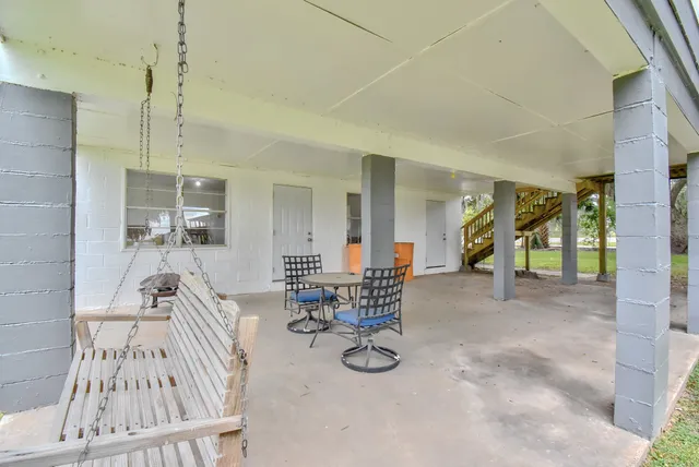 a living room with furniture and a couch