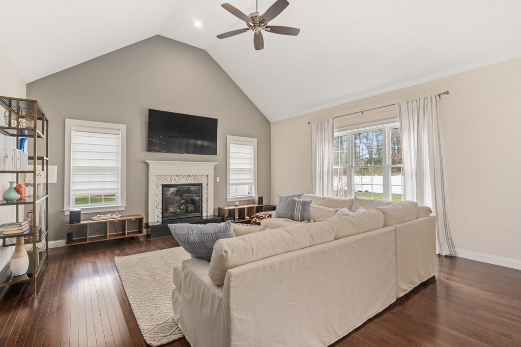 3 Dutton Drive Mansfield, MA 02048 - Photo 19 of 42 a living room with furniture and a fireplace