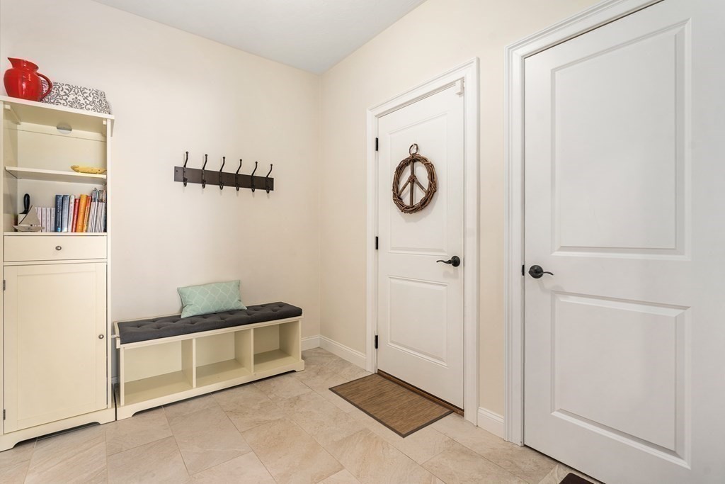 3 Dutton Drive Mansfield, MA 02048 - Photo 24 of 42 a view of a storage & utility room with closet dryer