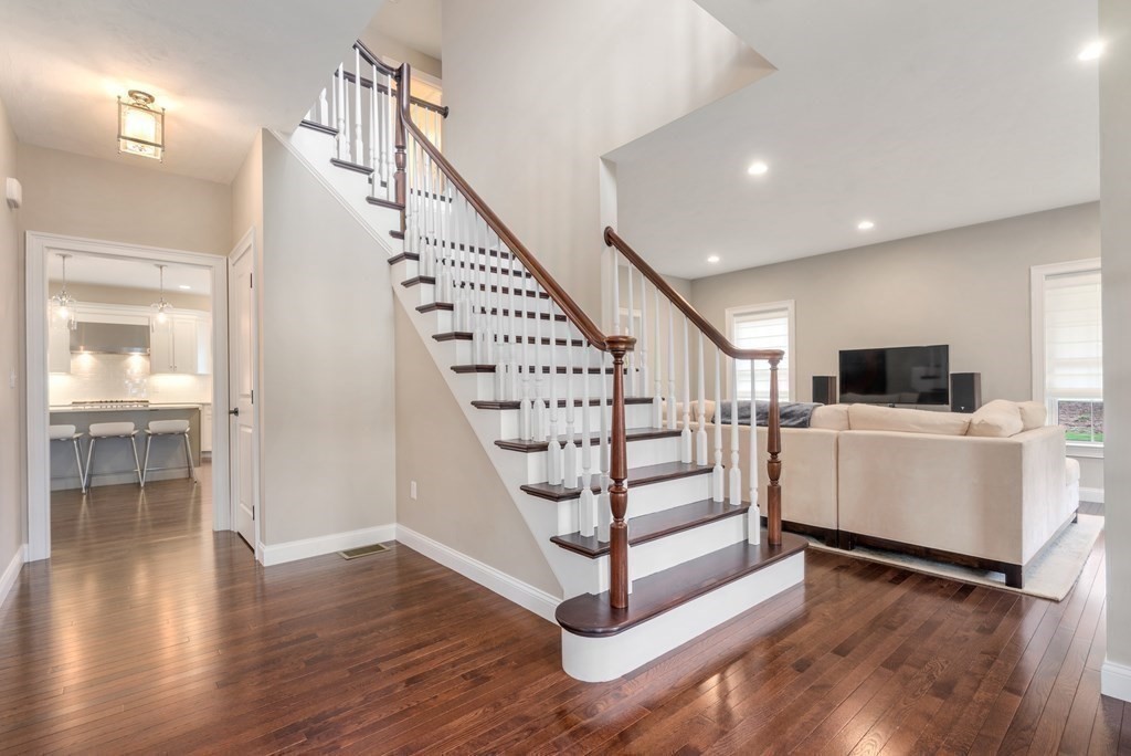 3 Dutton Drive Mansfield, MA 02048 - Photo 26 of 42 a view of entryway and hall with wooden floor