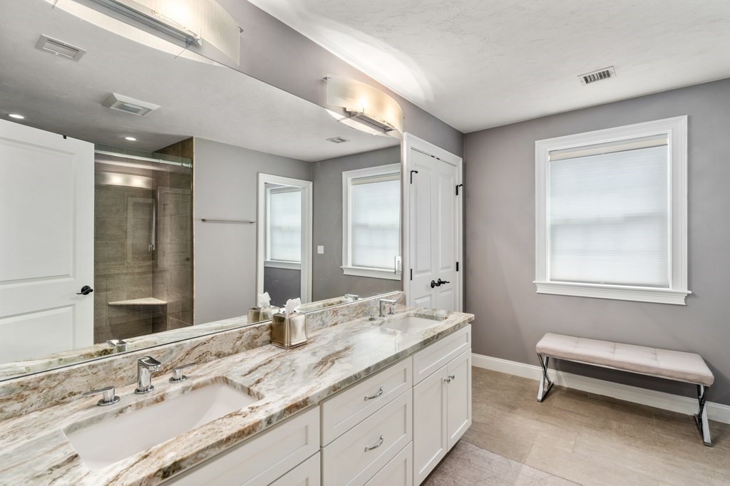 3 Dutton Drive Mansfield, MA 02048 - Photo 30 of 42 a bathroom with a granite countertop sink mirror and a