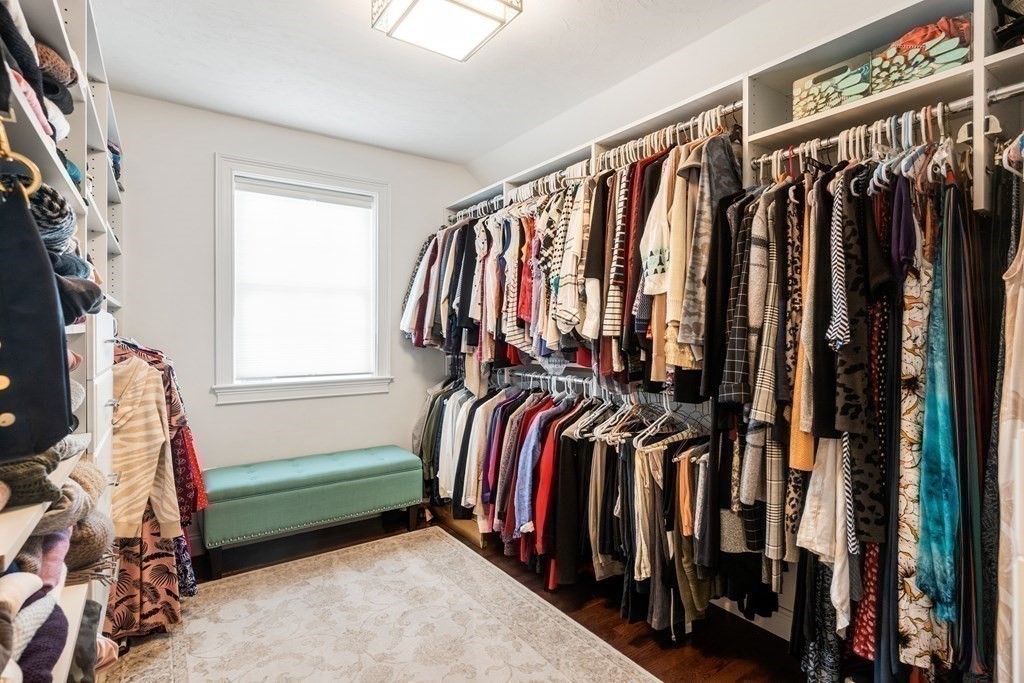 3 Dutton Drive Mansfield, MA 02048 - Photo 32 of 42 a view of walk in closet with clothes and shoes